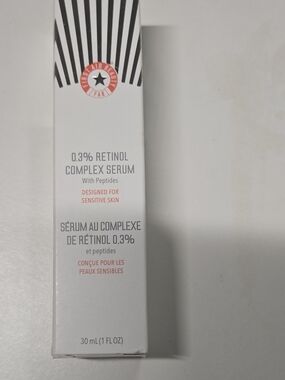First Aid Beauty 0.3% Retinol Complex Serum - White with Coral Accents